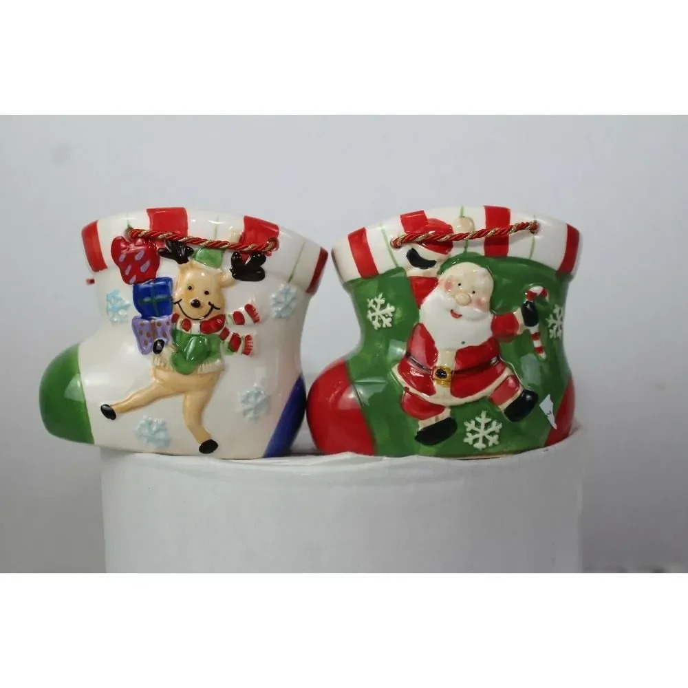Santa holiday ceramic slippers 5in tall 4in long